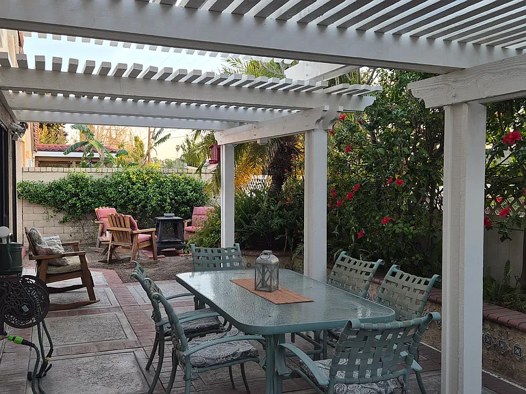 comfortable patio dining with shade from the new patio cover
