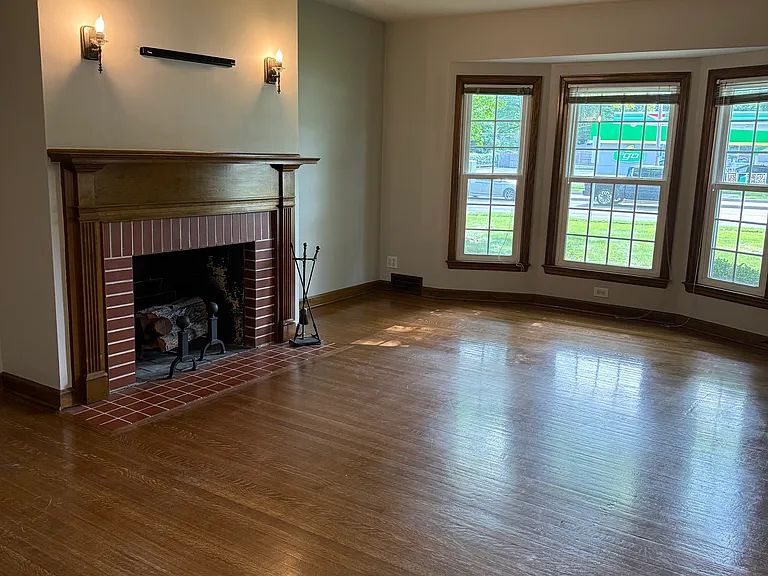 Living room with wood-burning fireplace