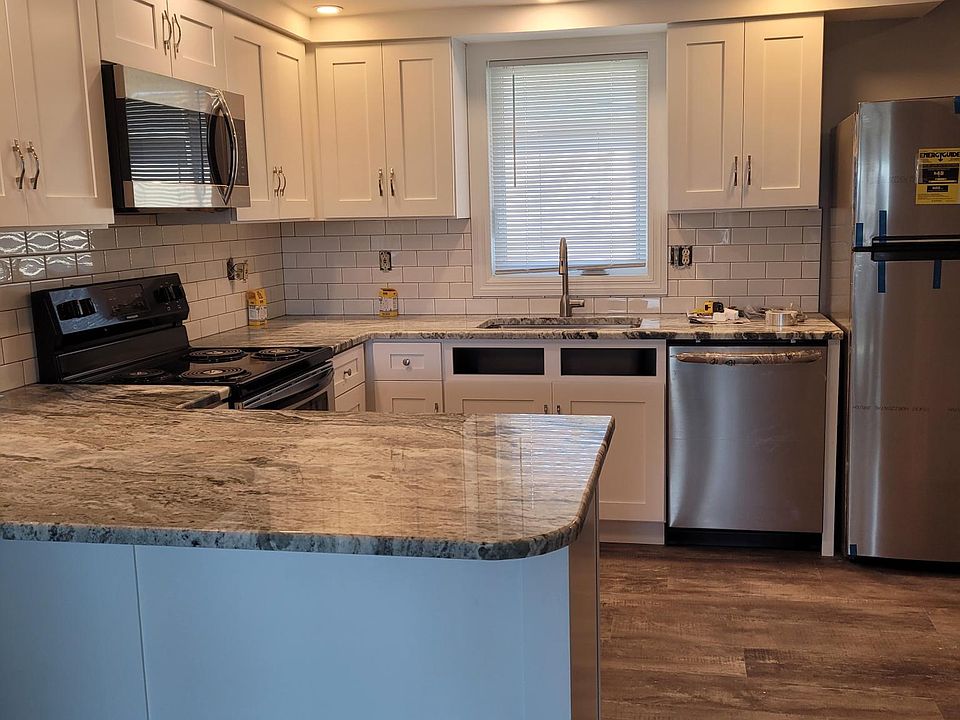 Kitchen with granite counters and SS appliances