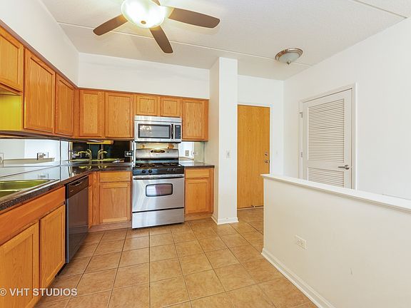 5th image of 3401 Wellington Ct Unit 203