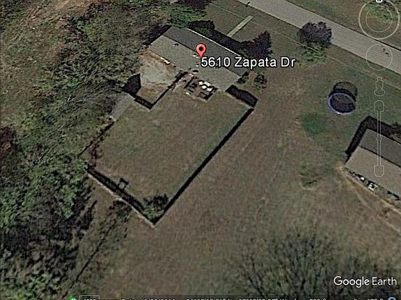 Google maps view of home and fenced in backyard