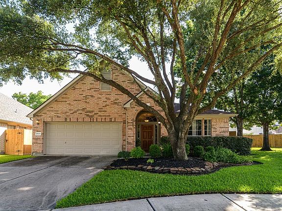 Checkout this amazing tree, relax in your front yard of this cul d sac home.