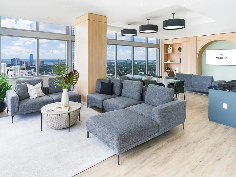 Host, relax, and take in sweeping views from Modera Riverside's 36th floor resident lounge.