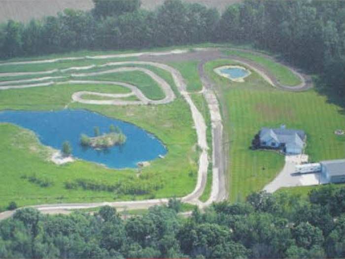 Arial of house and pond a