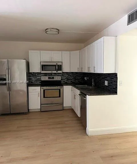 251 SW 132nd Way #204H — Photo 1