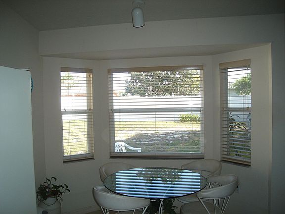 Breakfast nook w/custom blinds 