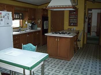 View of dining to kitchen area.