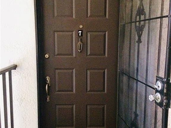 4th image of 8041 S Woods Cir Unit 7