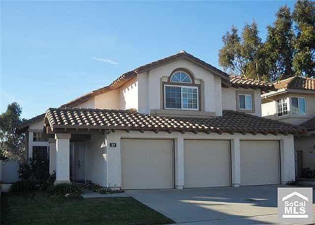 Front of beautiful and inviting RSM home with 3-car garage.