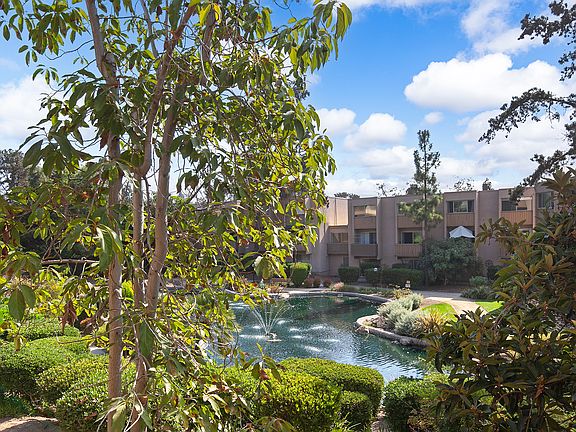 Living Room Balcony overlooking lower pond with 2 fountains.
