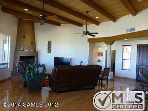 Great room with beehive fireplace.