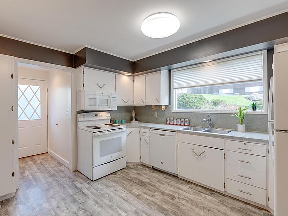 Sunny and bright kitchen. Fresh and clean.