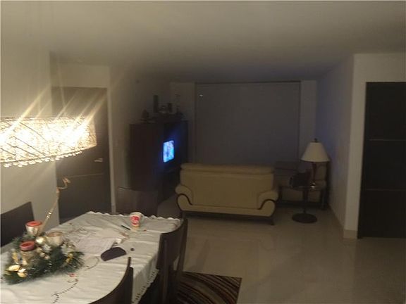 4th image of 3600 Mystic Pointe Dr APT 409
