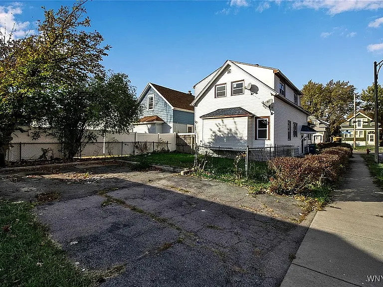 Open Parking Space for 2 cars behind the house