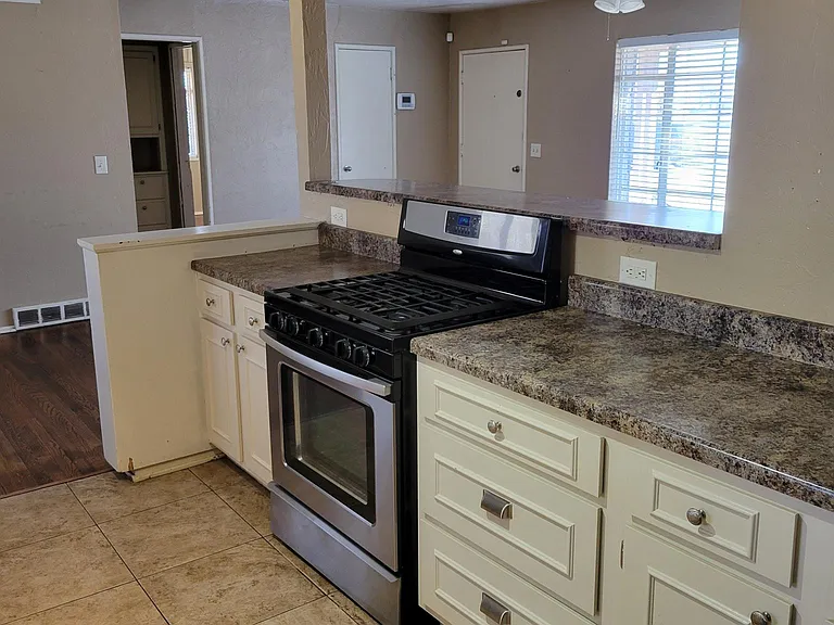Open kitchen with bar area
