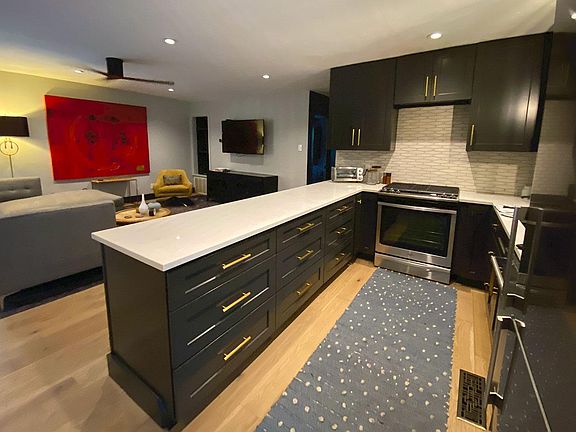 Kitchen with Marble Counters and High End Appliances