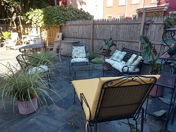 Slate Patio for relaxing, custom storage for outdoor gear.