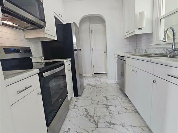 5th image of 113 N Abat St