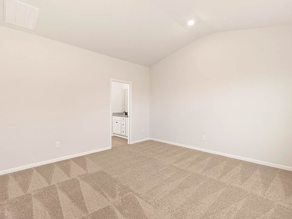 The master bedroom has enough space for your king-sized furniture.