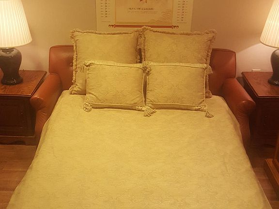 Full sized sofa bed folds away for seating.