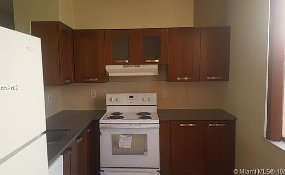5th image of 825 NE 212th Ter APT 1