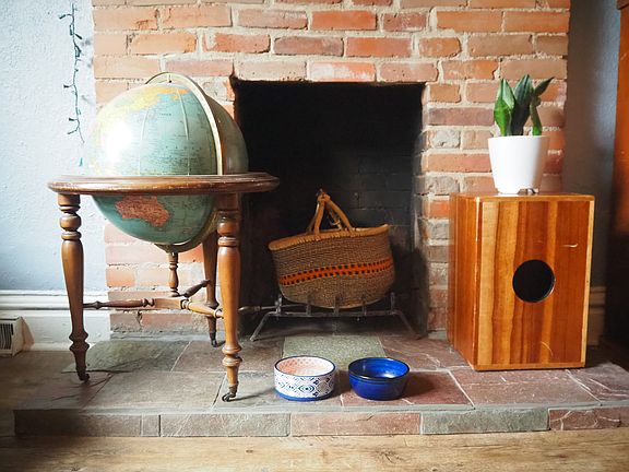 Non-functioning but charming fireplace.
