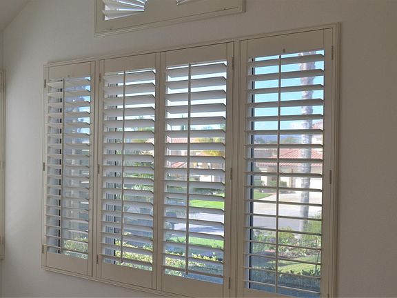 Shutters in most rooms of home