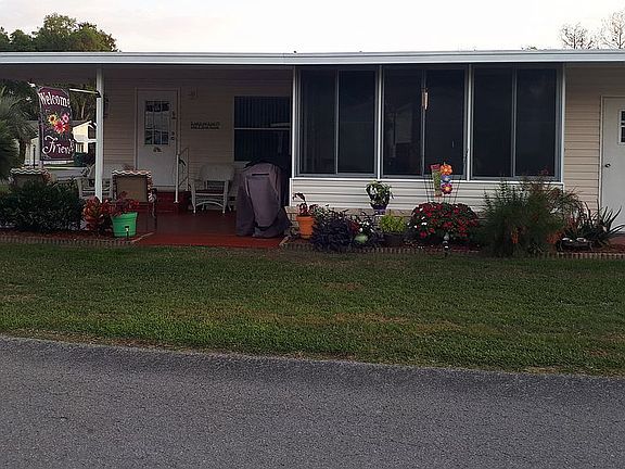 side view. On large corner lot