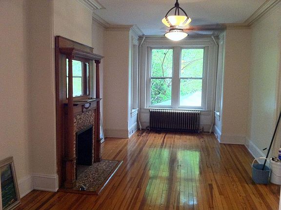 Living Room with ornate Art Deco fan spinning away!