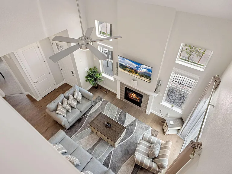 View of living room from the upstairs loft area