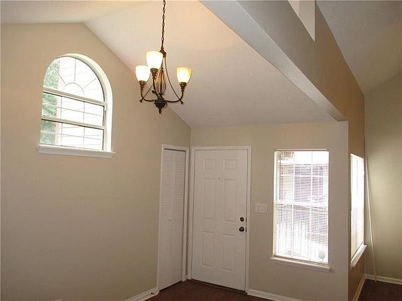 Vaulted entry/Dining room