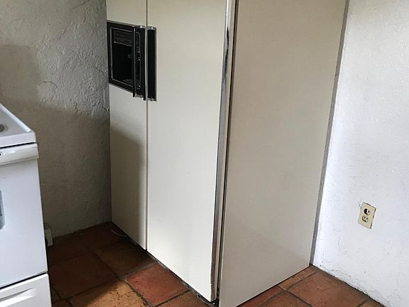 This is a photo of the previous frig. A newer one is in its place.