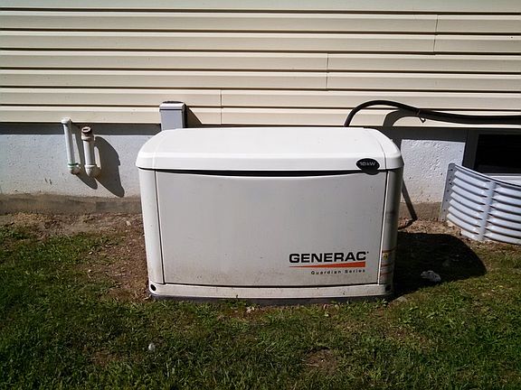 Generac Generator and two 100 gal propane tanks that can power for about 2 weeks