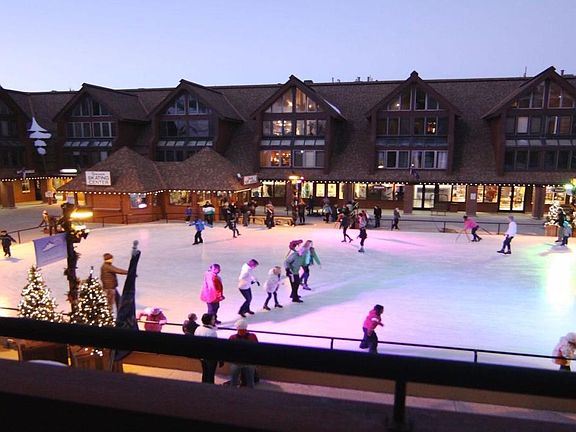 two balconies with views of ice skating rink