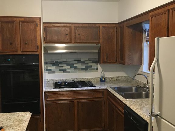 Kitchen. New counters & flooring. It has a dishwasher, gas cooktop and a gas oven. There is a ice maker in the freezer. Room for a upright freezer across from the fridge. Deep stainless sink with commercial disposal.