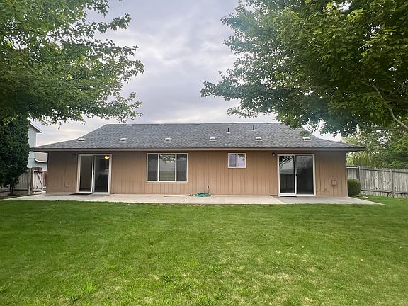 Large back yard with patio.