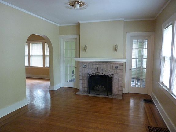 Livingroom with wood burning fireplace.