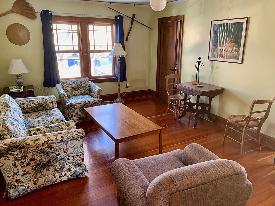 Living room with lots of light flowing in.