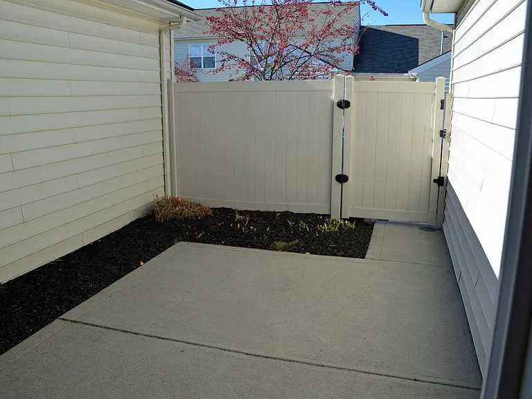 Private Fenced Patio with perennials