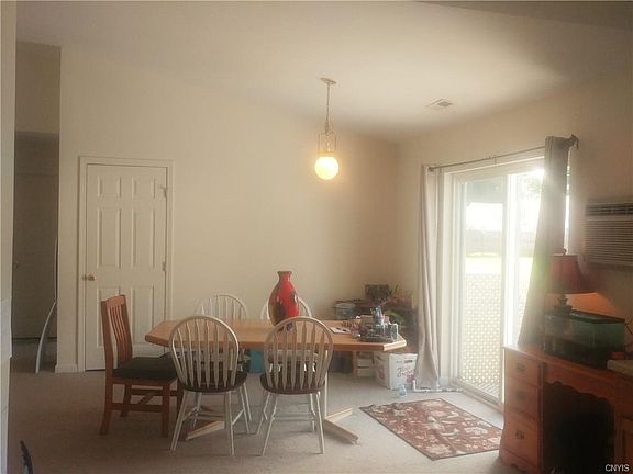 Dining Area with sliders that lead to back deck and yard.