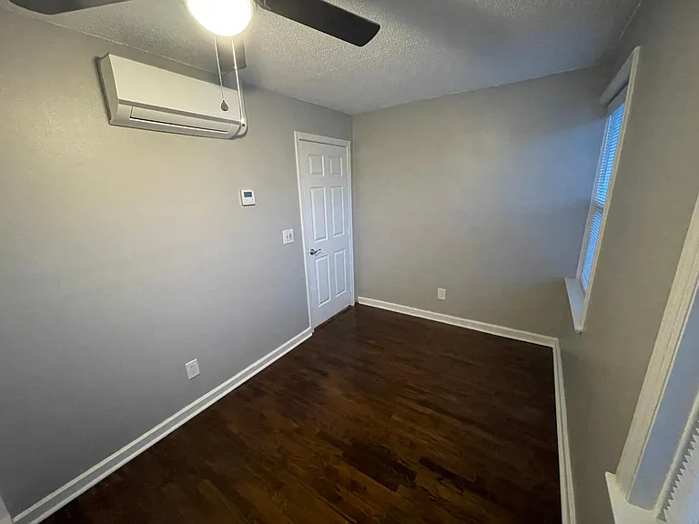 Bedroom - with new windows, HVAC, and refinished floors