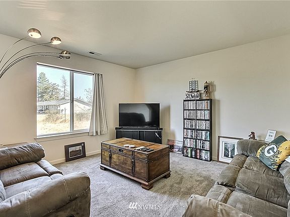 Another view of family room, note large window. 