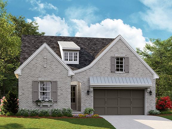 Covina B - English Cottage 2-Car Front Load Garage Note Renderings may show optional features