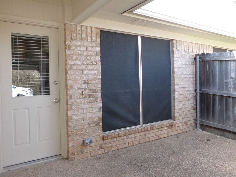Back door and patio with shade scr eens