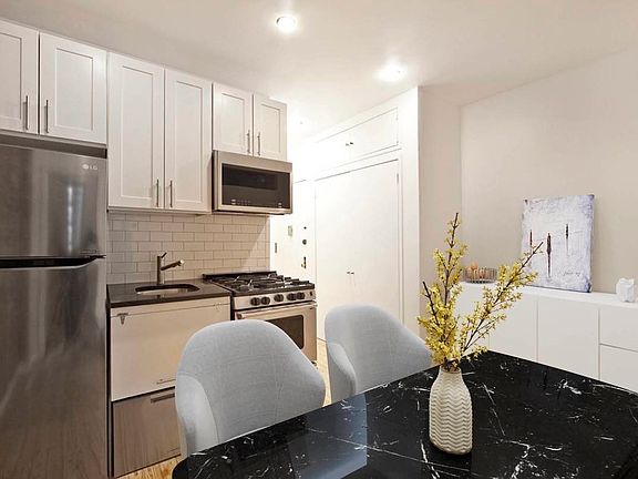 5th image of 52 E 7th St APT 10