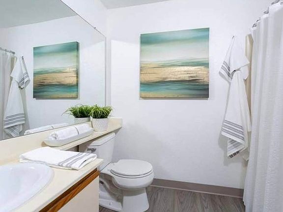 Master Bathroom (Staged for illustrative purposes only; unit is unfurnished)