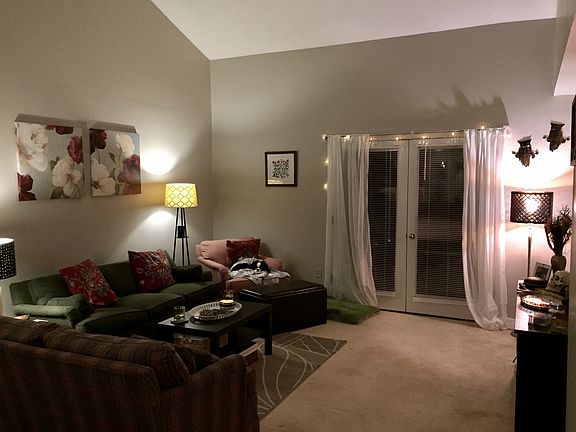 Living room with entrance to outside patio