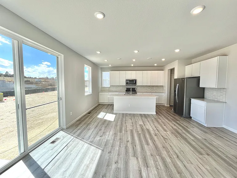 Part of family room and kitchen