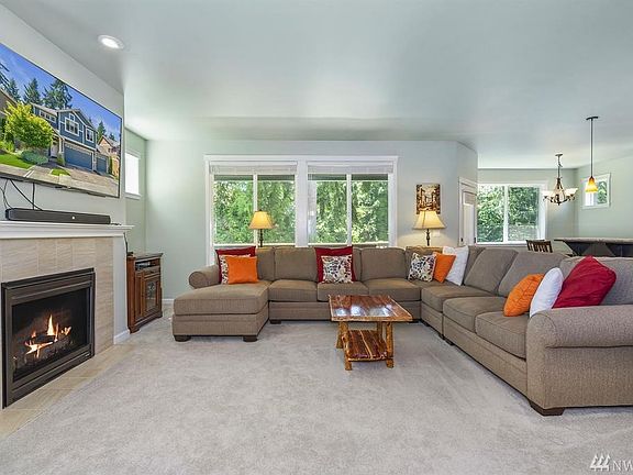 Spacious family room with gas fireplace. 