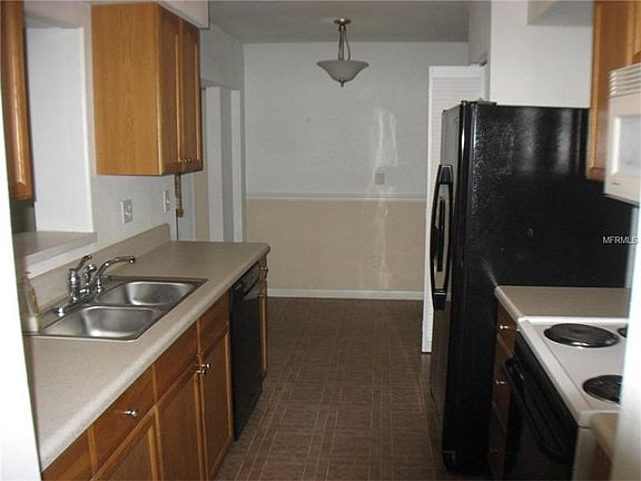 Kitchen updates include Oakwood cabinet finish